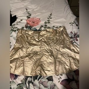 Torrid size 3 gold strapless top. NWOT.